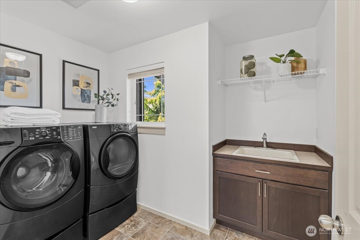 21720 39th Drive Southeast Bothell, WA 98021 - Photo 22 of 40 a utility room with dryer and washer