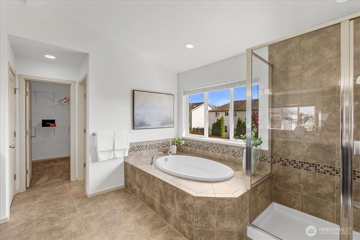 21720 39th Drive Southeast Bothell, WA 98021 - Photo 31 of 40 a bathroom with a sink toilet and shower