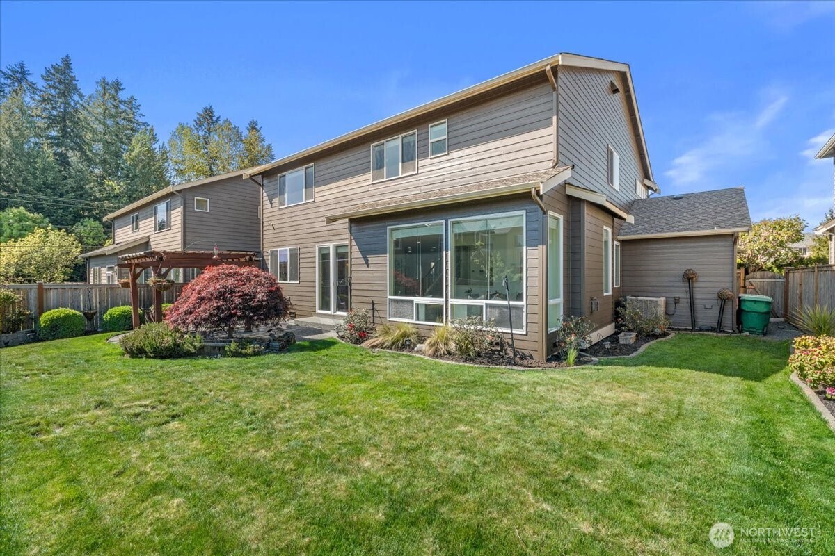 21720 39th Drive Southeast Bothell, WA 98021 - Photo 35 of 40 a view of a house with a yard and porch
