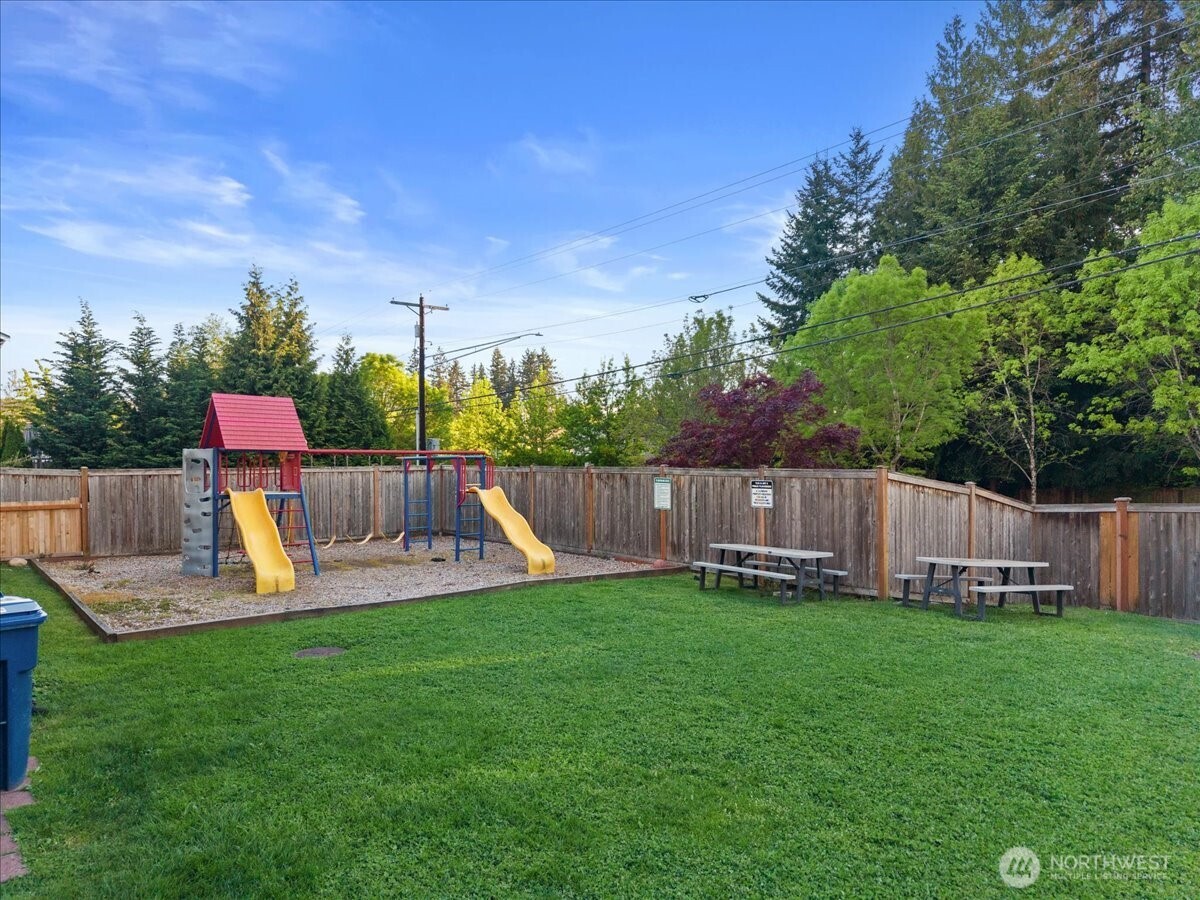 21720 39th Drive Southeast Bothell, WA 98021 - Photo 38 of 40 a view of a chair and table in the garden