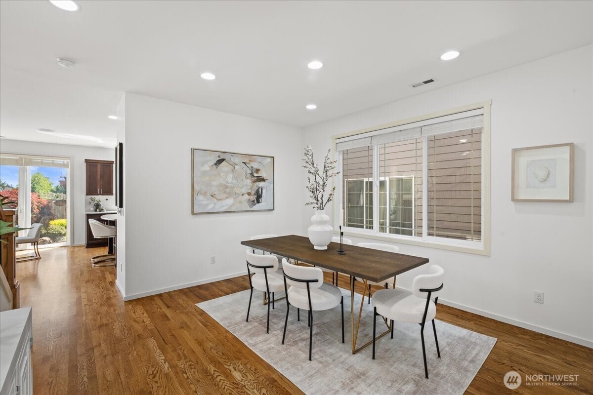 21720 39th Drive Southeast Bothell, WA 98021 - Photo 4 of 40 a view of a dining room with furniture and wooden floor