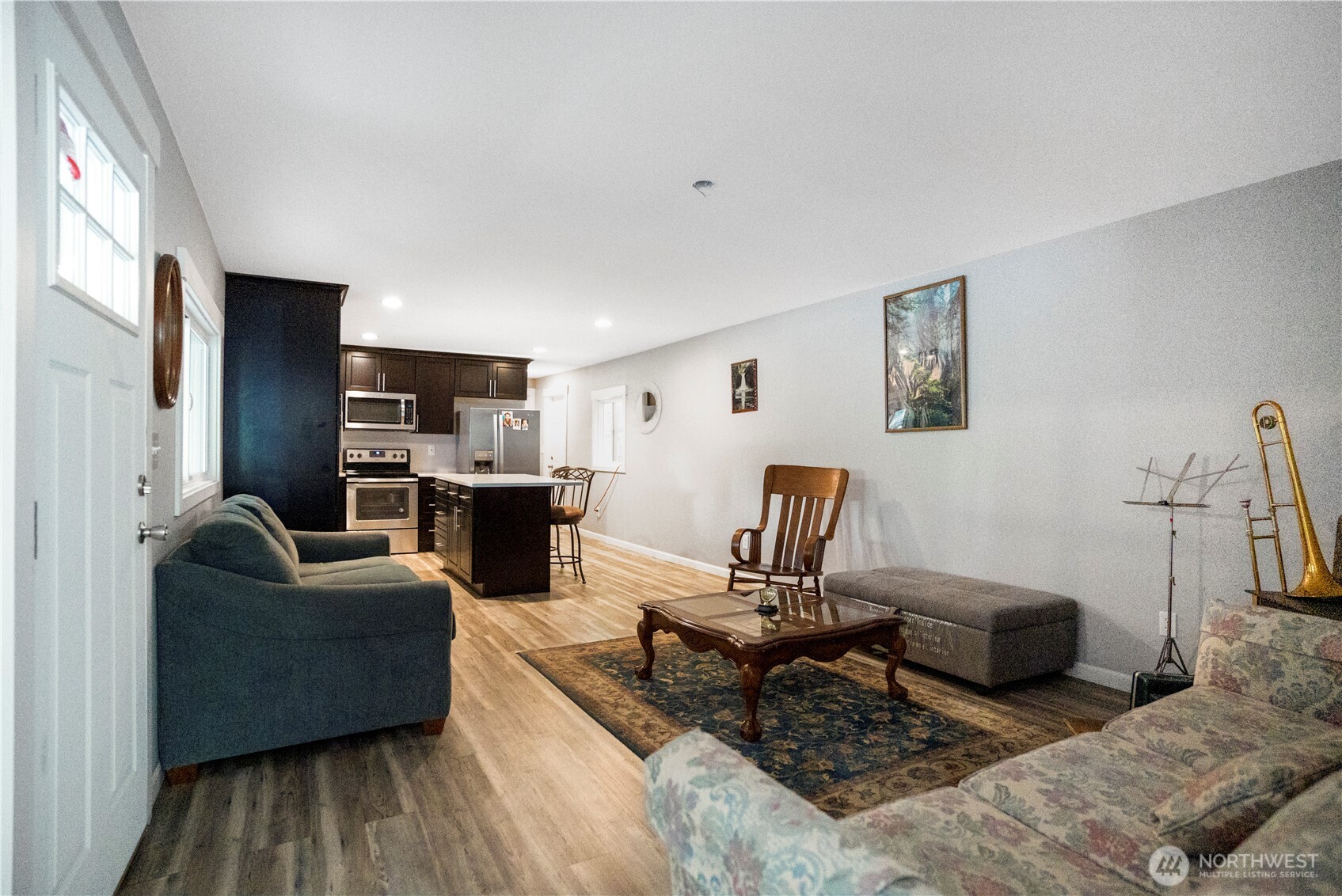3333 228th Street Southeast, Unit 74 Bothell, WA 98021 - Photo 7 of 17 a living room with furniture and a couch