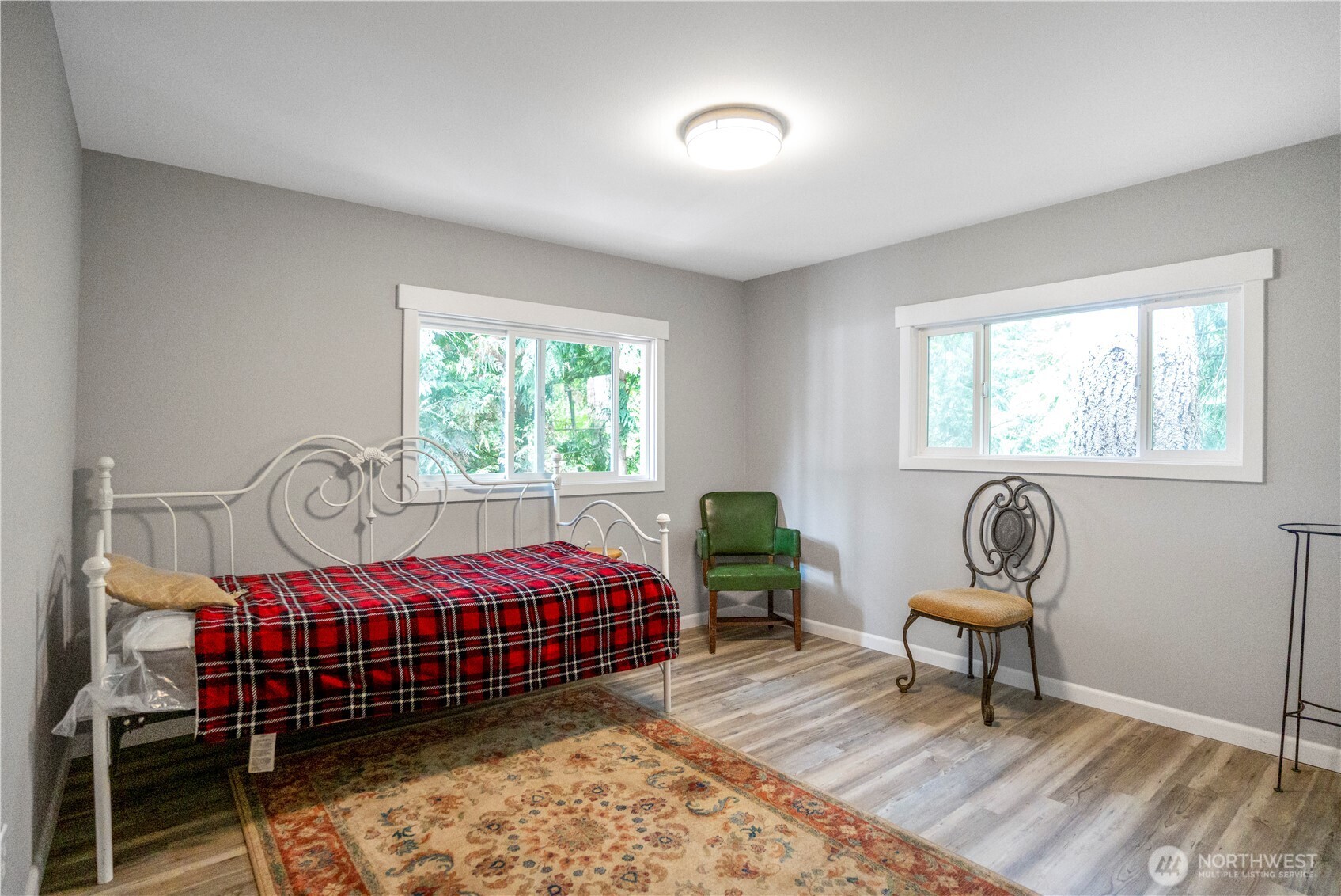 3333 228th Street Southeast, Unit 74 Bothell, WA 98021 - Photo 9 of 17 a bedroom with a bed chair and window