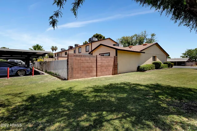 a house view with a garden space