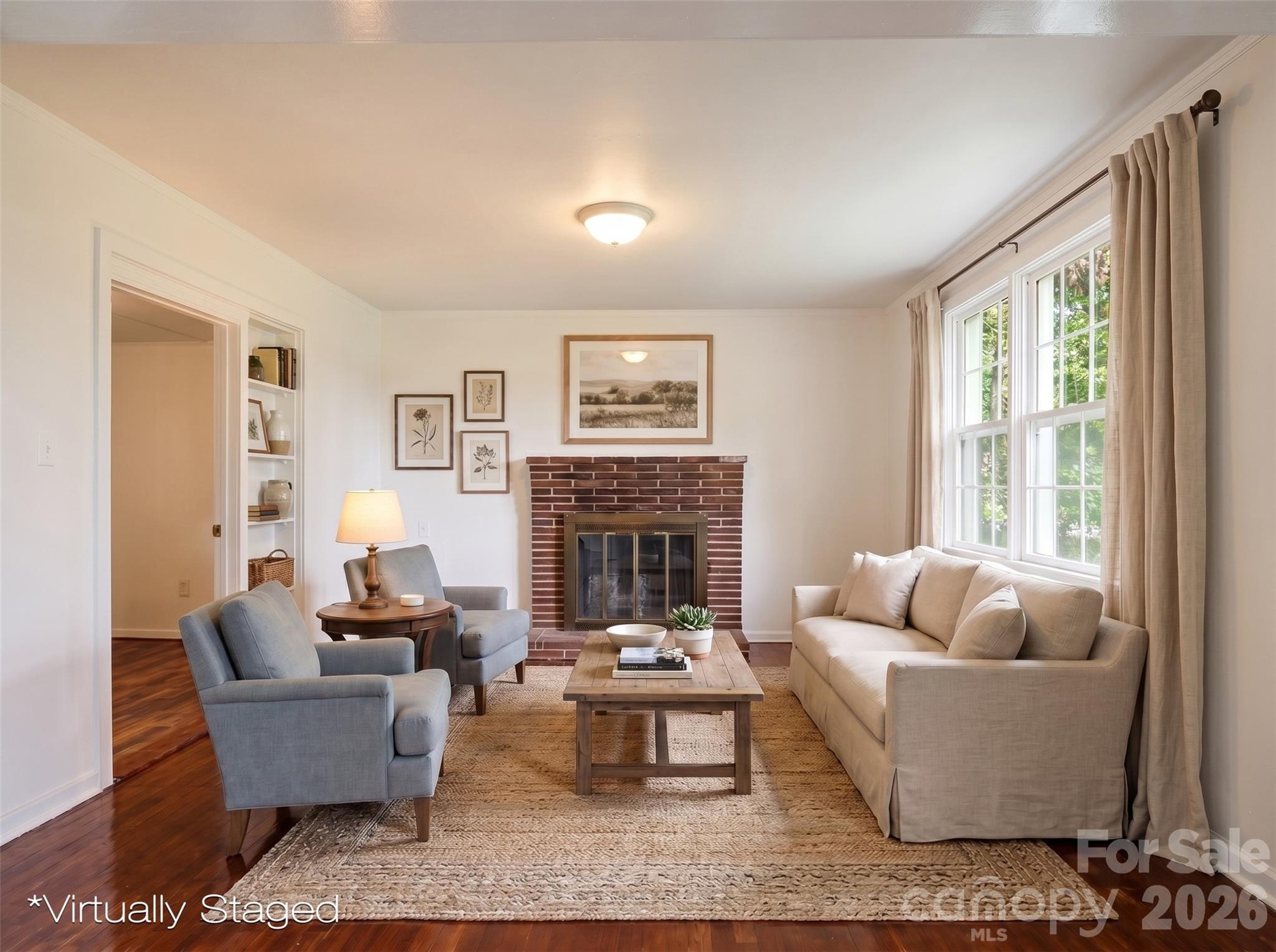 128 Ella Street Chester, SC 29706 - Photo 2 of 18 a living room with furniture and a fireplace