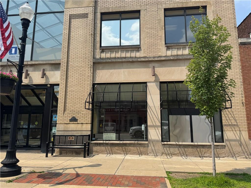 a front view of a house with garage