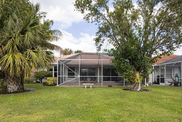 a view of swimming pool with outdoor seating