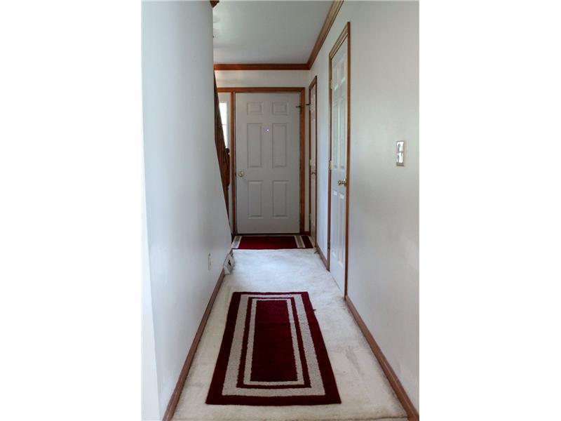 386 Henderson Station Road Stoneboro, PA 16153 - Photo 14 of 25 Other. Hallway leading to the front stairway