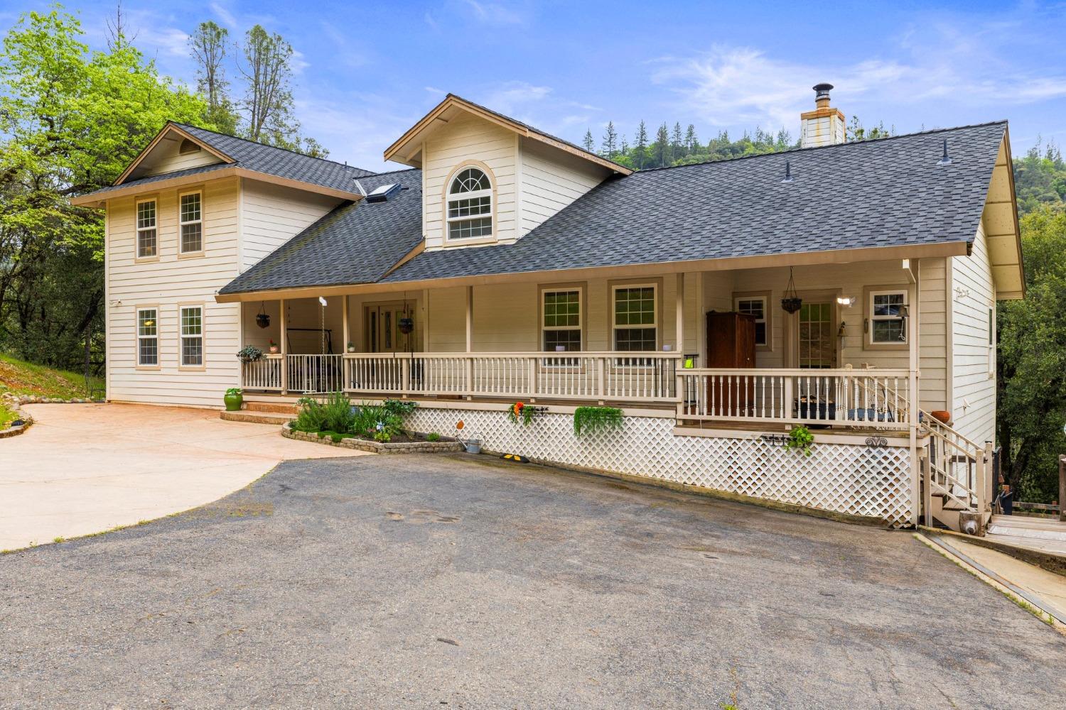 6432 Happy Valley Road Somerset, CA 95684 - Photo 25 of 90 front view of a house with a yard