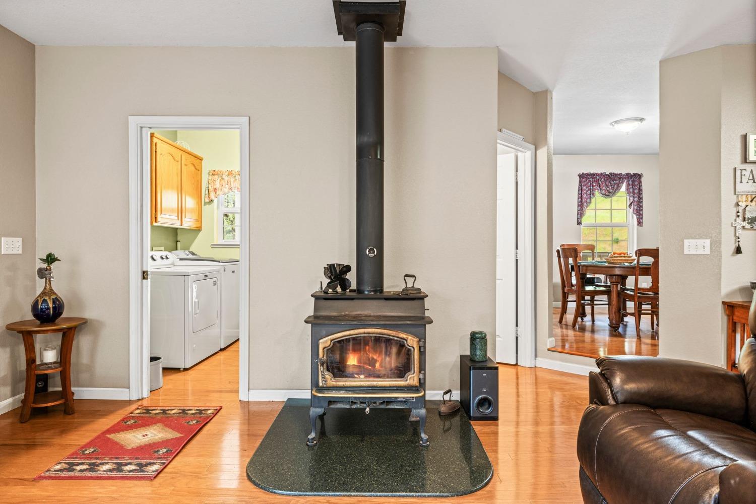 6432 Happy Valley Road Somerset, CA 95684 - Photo 35 of 90 a living room with furniture and a fireplace