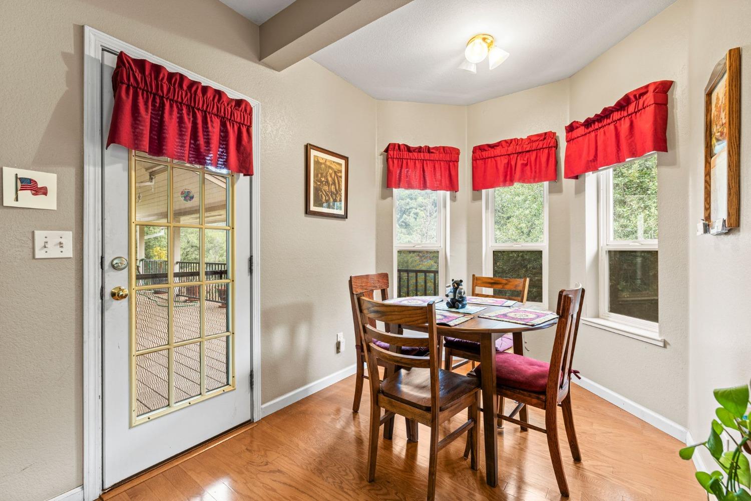 6432 Happy Valley Road Somerset, CA 95684 - Photo 40 of 90 a view of a dining room with furniture window and outside view