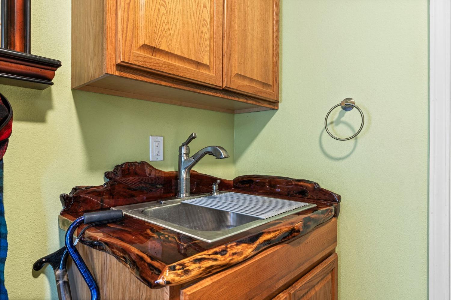 6432 Happy Valley Road Somerset, CA 95684 - Photo 70 of 90 a kitchen with stainless steel appliances granite countertop a sink and cabinets