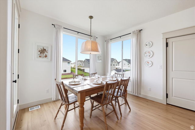 283 North 500 West Mapleton, UT 84664 - Photo 20 of 102 Dining room featuring beautiful windows for natural light. Butler Pantry door.