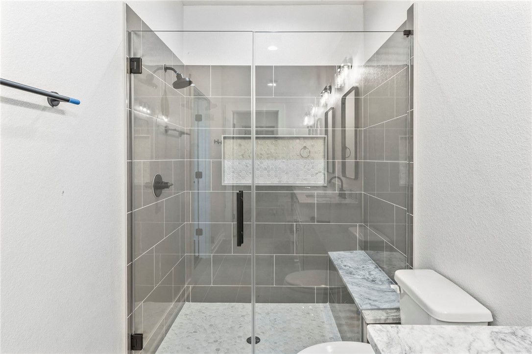 2102 Joppi Court Bryan, TX 77807 - Photo 11 of 27 a bathroom with a shower