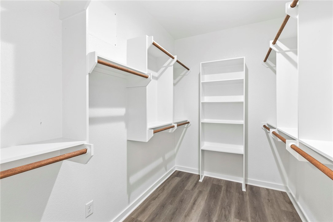 2102 Joppi Court Bryan, TX 77807 - Photo 12 of 27 a view of walk in closet with empty racks