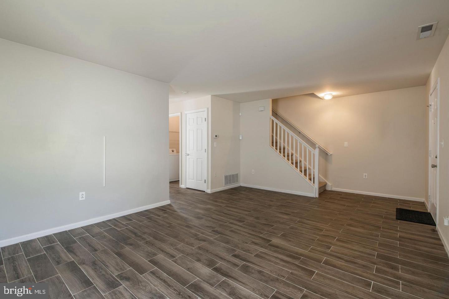 3718 Merrick Road Philadelphia, PA 19129 - Photo 30 of 30 a view of an empty room with wooden floor