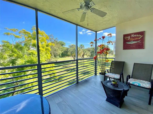 a room with furniture and wooden floor