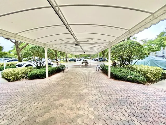 a view of a patio with potted plants