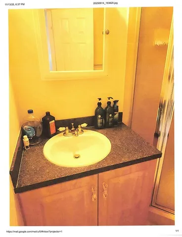 a bathroom with a toilet and a sink