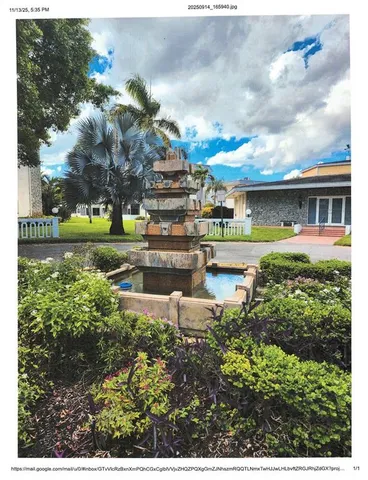 a view of a water with large building in front of it