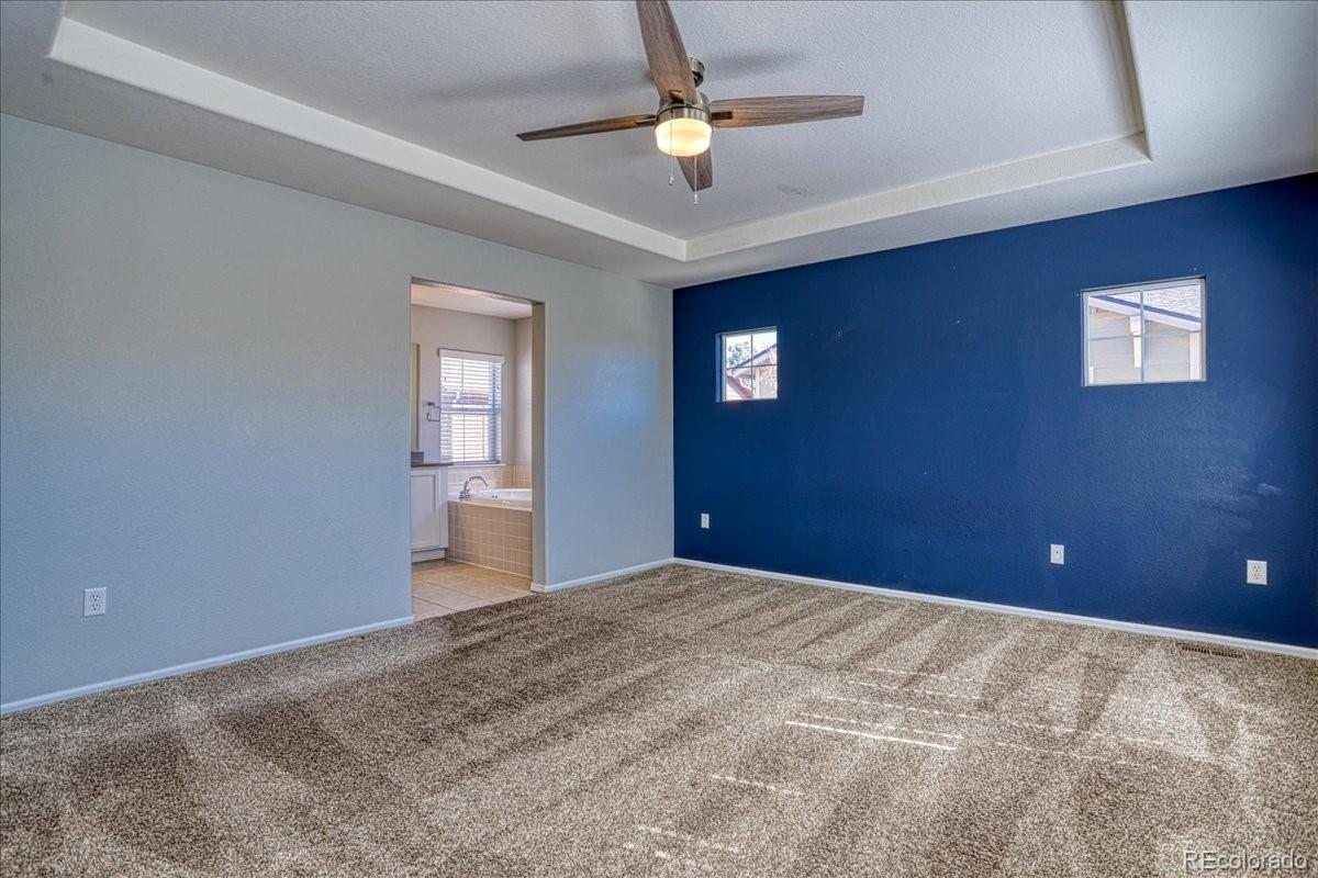 4005 Blue Pine Circle Highlands Ranch, CO 80126 - Photo 16 of 27 a view of an empty room with a window