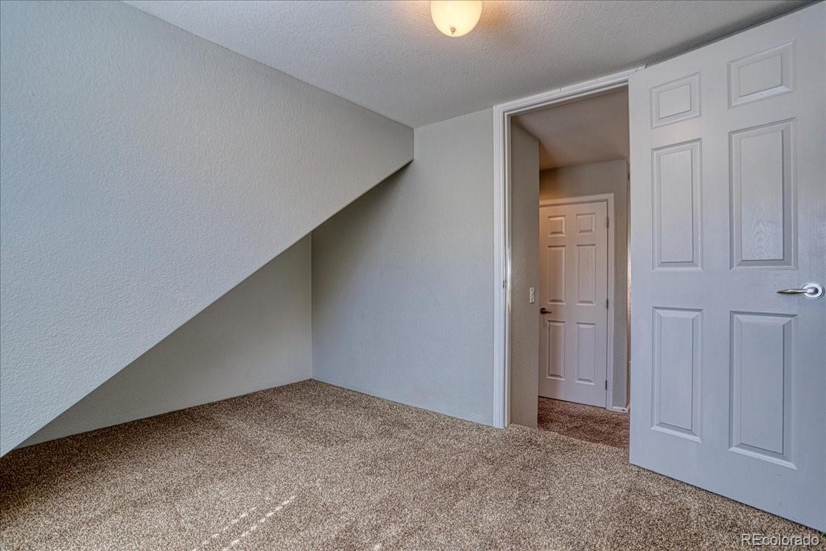 4005 Blue Pine Circle Highlands Ranch, CO 80126 - Photo 23 of 27 a view of an empty room and entryway