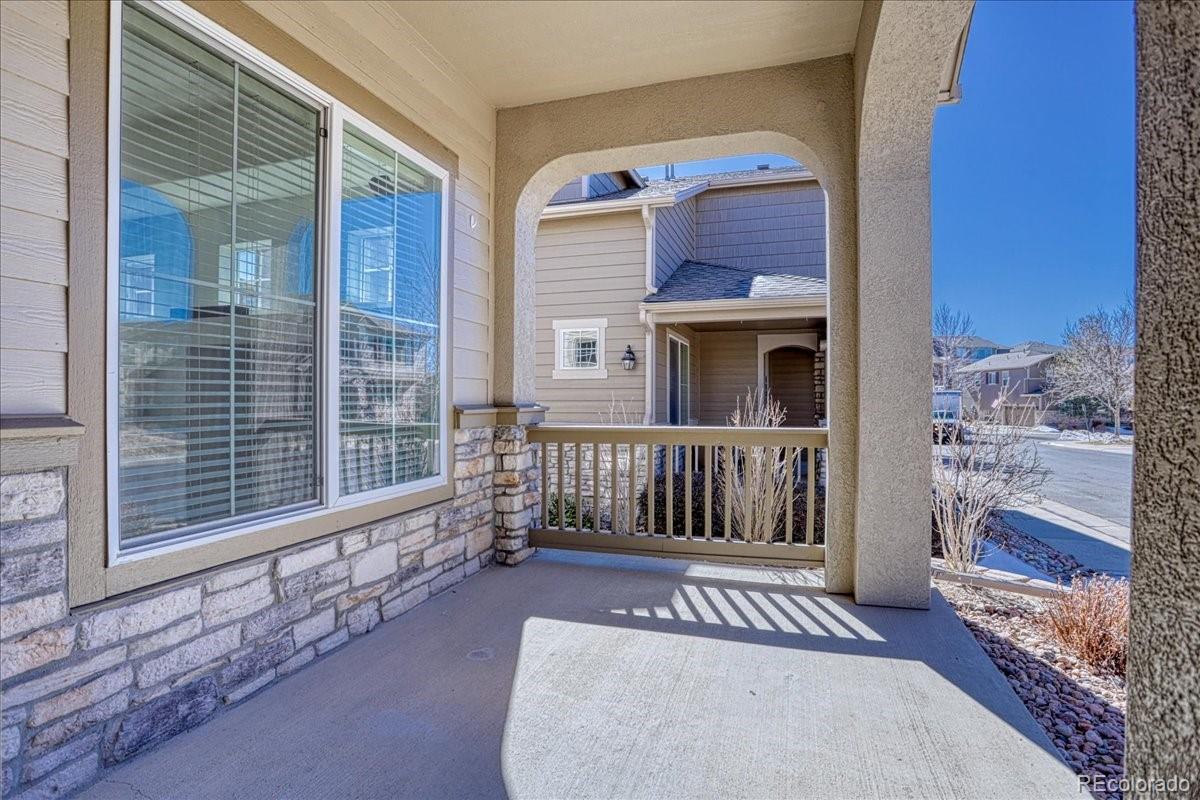 4005 Blue Pine Circle Highlands Ranch, CO 80126 - Photo 3 of 27 a view of front door of house