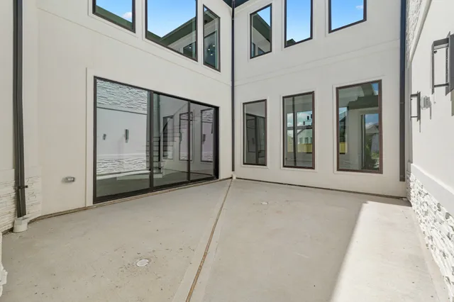 a view of a hallway with closet area