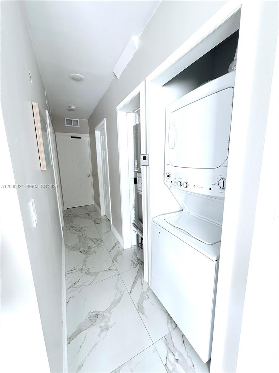 11020 Southwest 42nd Terrace Miami, FL 33165 - Photo 13 of 22 a bathroom with a sink a toilet and a shower