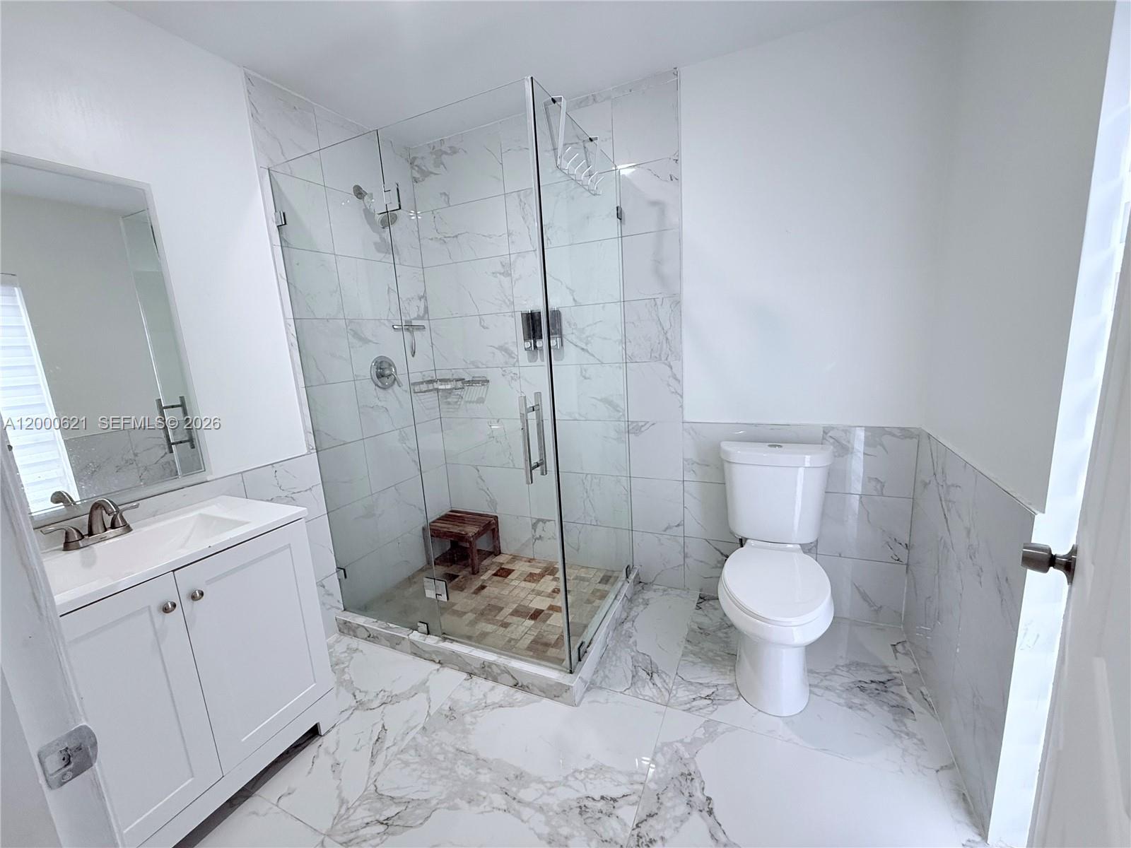 11020 Southwest 42nd Terrace Miami, FL 33165 - Photo 17 of 22 a spacious bathroom with a sink toilet and shower