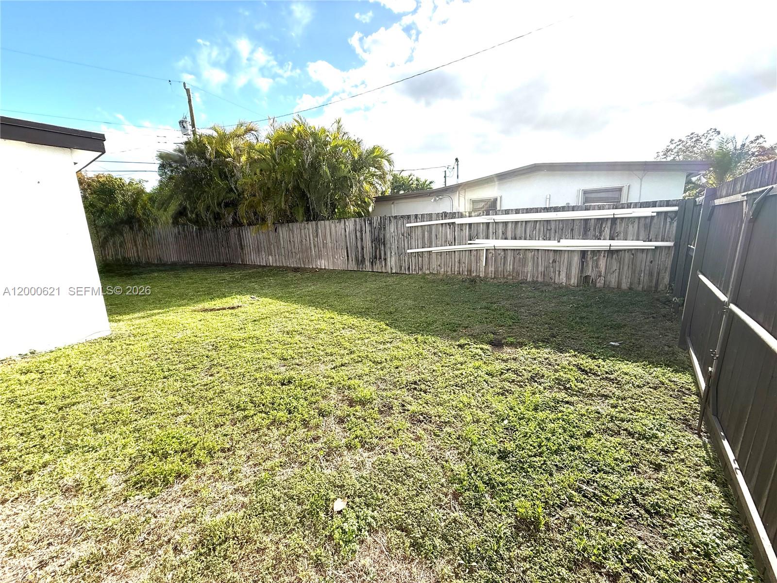 11020 Southwest 42nd Terrace Miami, FL 33165 - Photo 19 of 22 a view of a backyard
