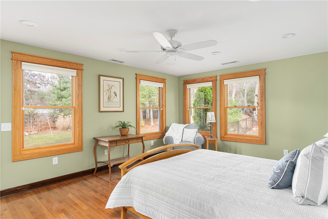267 Widow Sweets Road Exeter, RI 02822 - Photo 12 of 46 Another view of the Master bedroom with lots of windows for natural light.