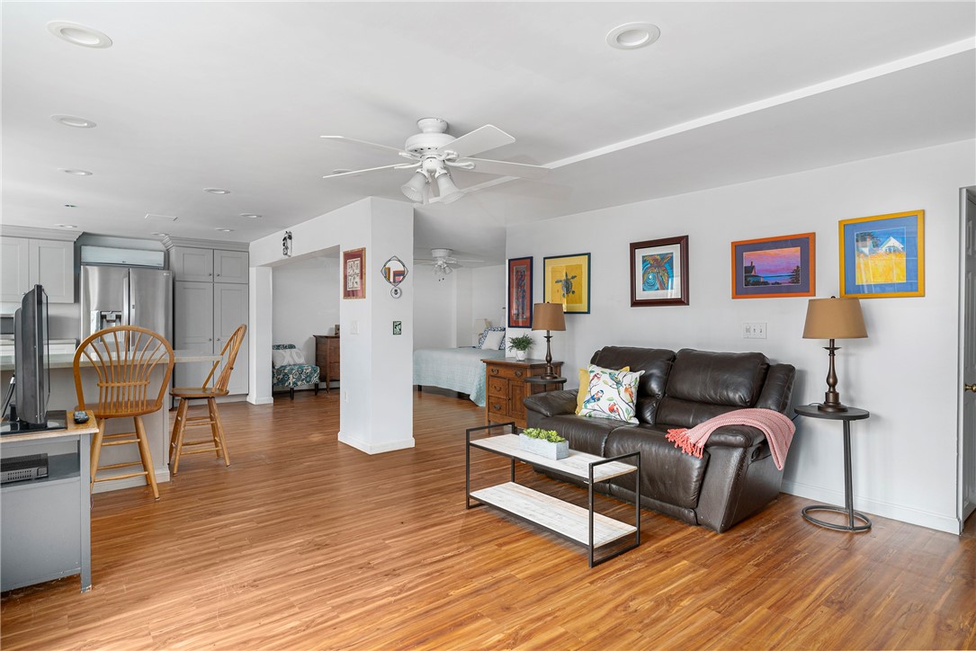 267 Widow Sweets Road Exeter, RI 02822 - Photo 20 of 46 Main house lower level living room, kitchen and bedroom area