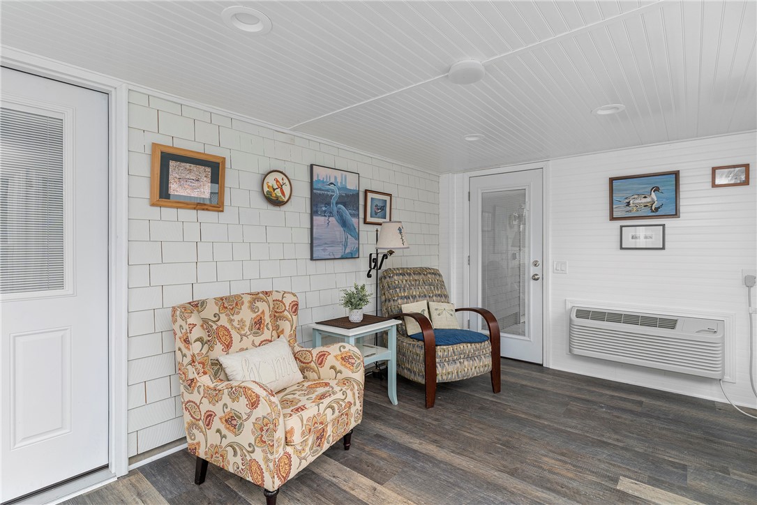 267 Widow Sweets Road Exeter, RI 02822 - Photo 28 of 46 Main house lower level 4 season room with heat and air conditioning