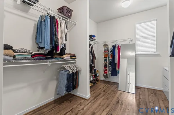 a view of a closet with storage