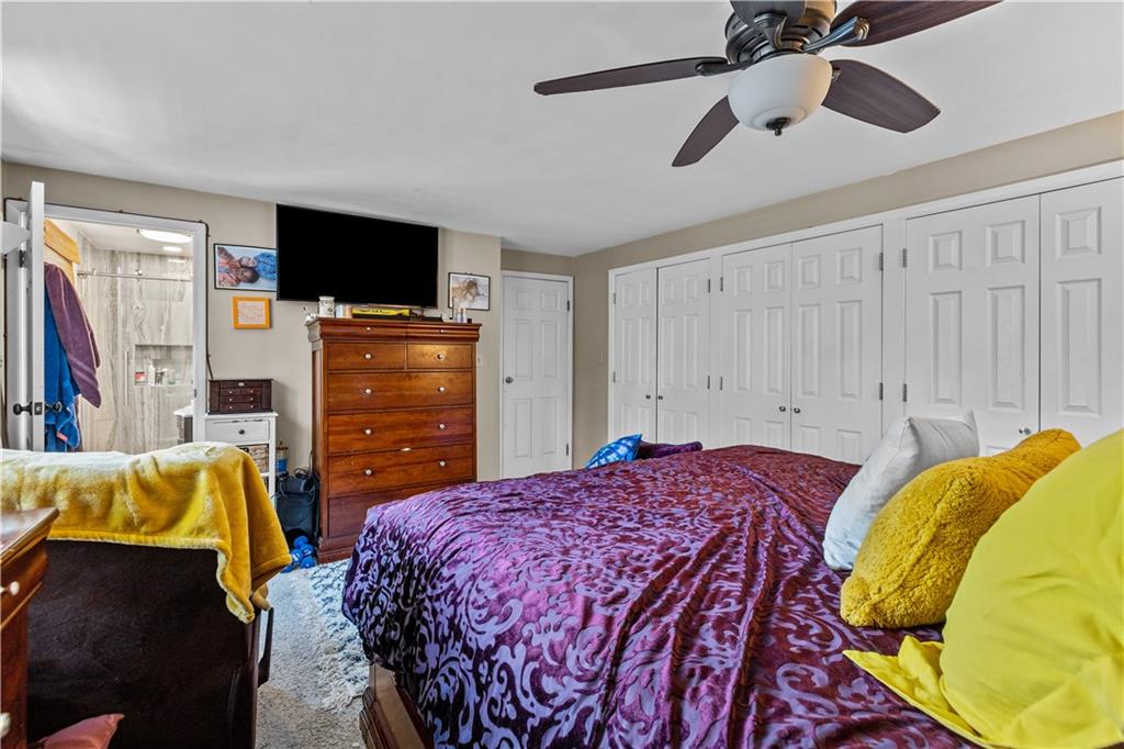 2116 Ramsey Road Monroeville, PA 15146 - Photo 18 of 28 a bedroom with a bed and flat screen tv