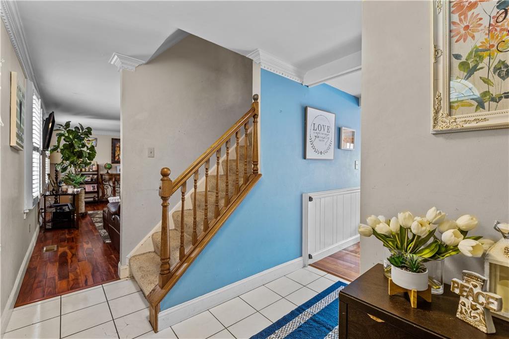 2116 Ramsey Road Monroeville, PA 15146 - Photo 2 of 28 a dining room with furniture and a potted plant
