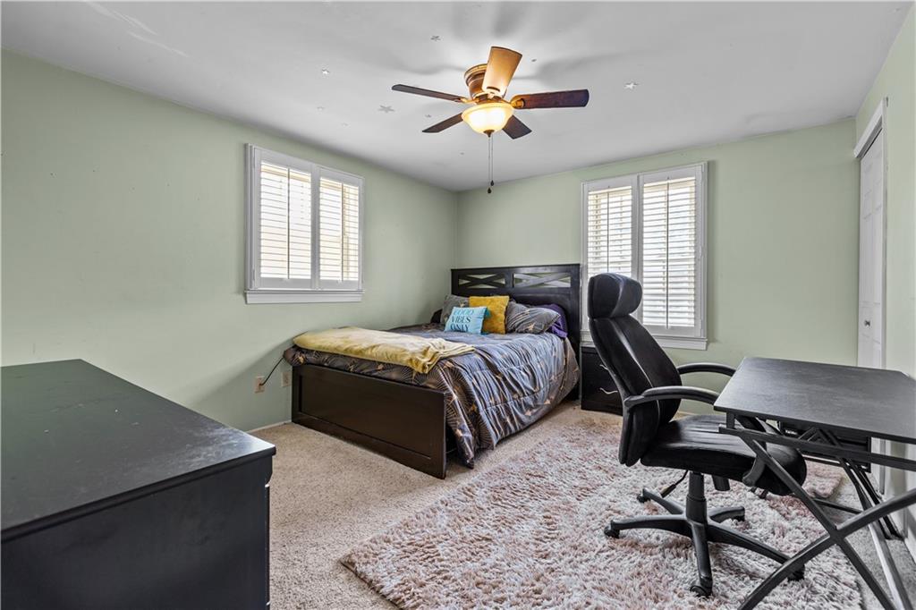 2116 Ramsey Road Monroeville, PA 15146 - Photo 21 of 28 a bedroom with a bed and a window