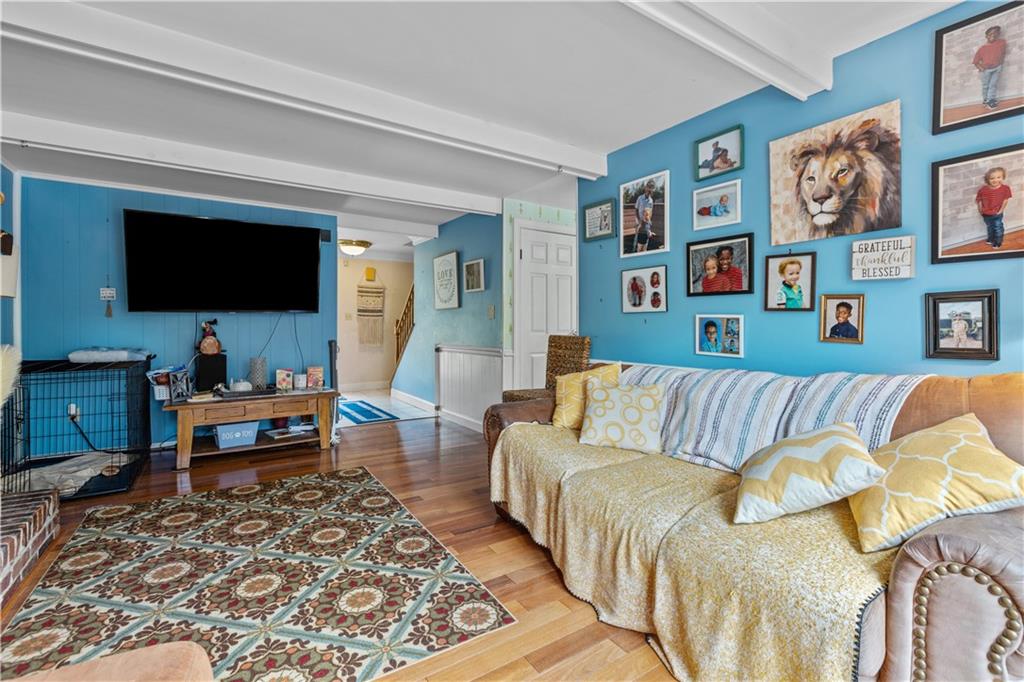 2116 Ramsey Road Monroeville, PA 15146 - Photo 6 of 28 a living room with furniture and a flat screen tv