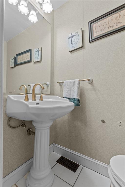 2116 Ramsey Road Monroeville, PA 15146 - Photo 9 of 28 a bathroom with a sink and a mirror