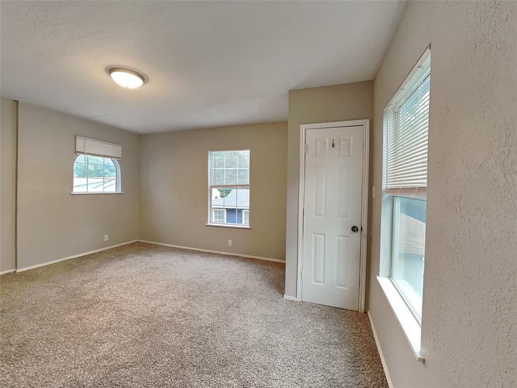 2911 Ryan Avenue Fort Worth, TX 76110 - Photo 26 of 27 a view of an empty room with a window