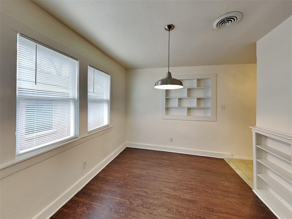 2911 Ryan Avenue Fort Worth, TX 76110 - Photo 5 of 27 a view of empty room with windows