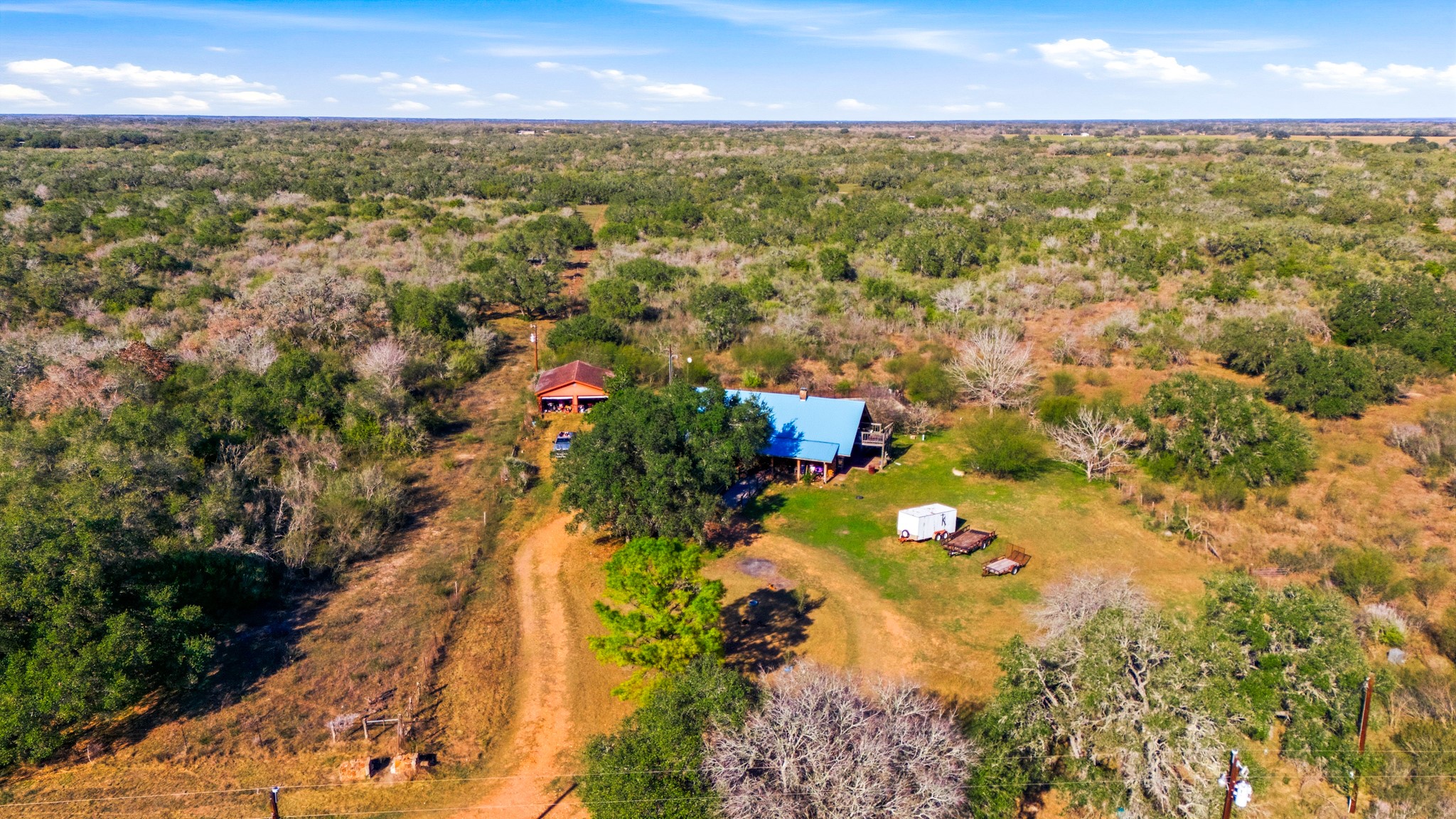 6347 Old Goliad Road Goliad, TX 77963 - Photo 36 of 42 an aerial view of residential houses with outdoor space