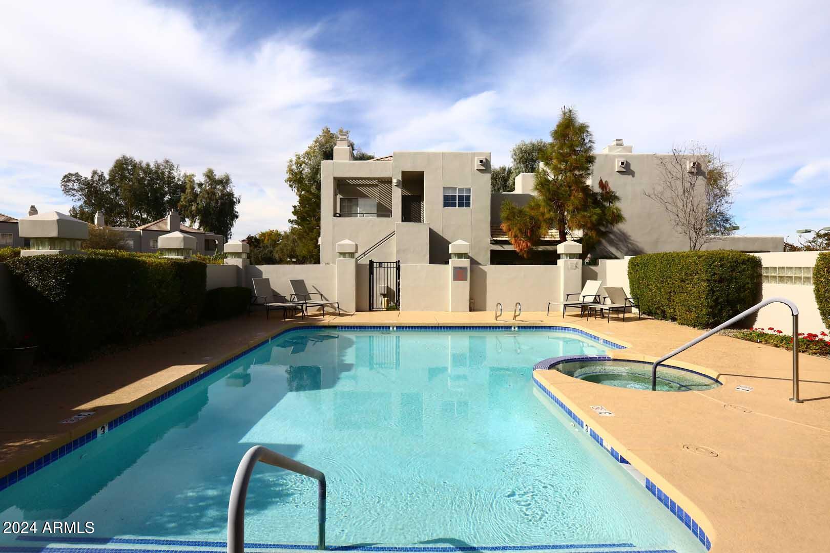 7710 East Gainey Ranch Road, Unit 229 Scottsdale, AZ 85258 - Photo 32 of 49 The Courts-Community Pool