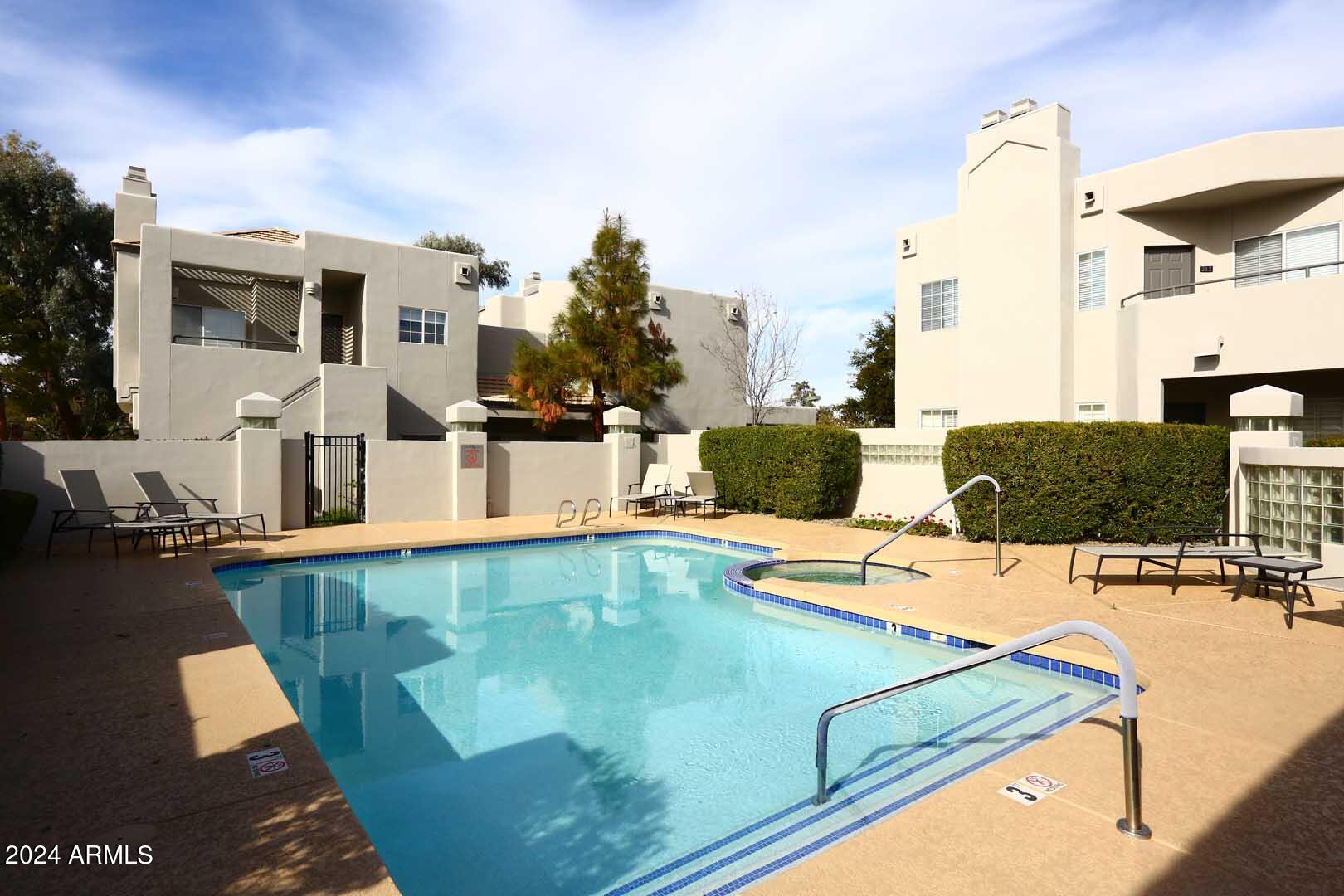 7710 East Gainey Ranch Road, Unit 229 Scottsdale, AZ 85258 - Photo 33 of 49 The Courts-Community Pool-Spa