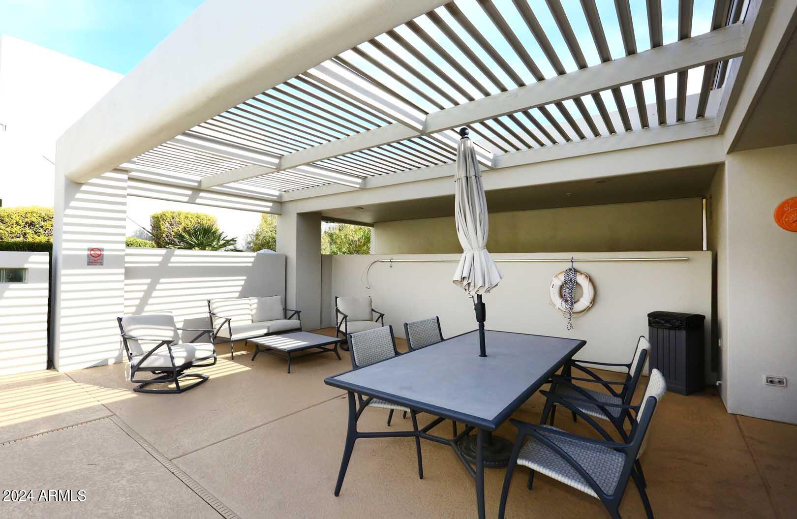 7710 East Gainey Ranch Road, Unit 229 Scottsdale, AZ 85258 - Photo 35 of 49 The Courts-Pool Patio