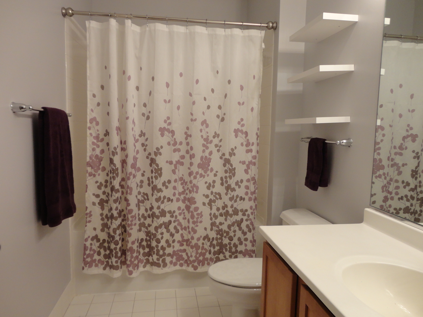 2323 West Pershing Road, Unit 136 Chicago, IL 60609 - Photo 18 of 20 a bathroom with a sink and mirror