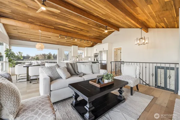 a living room with furniture and a table