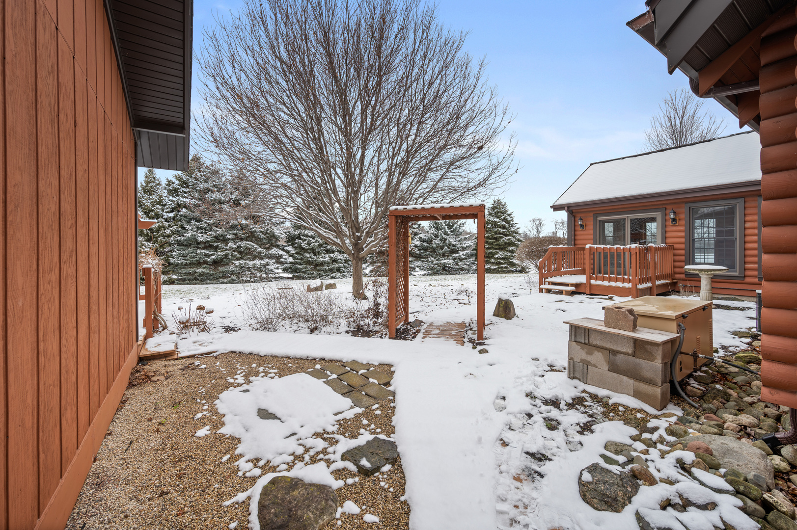 12005 Aldrich Road Sycamore, IL 60178 - Photo 8 of 50 a view of a patio with wooden fence