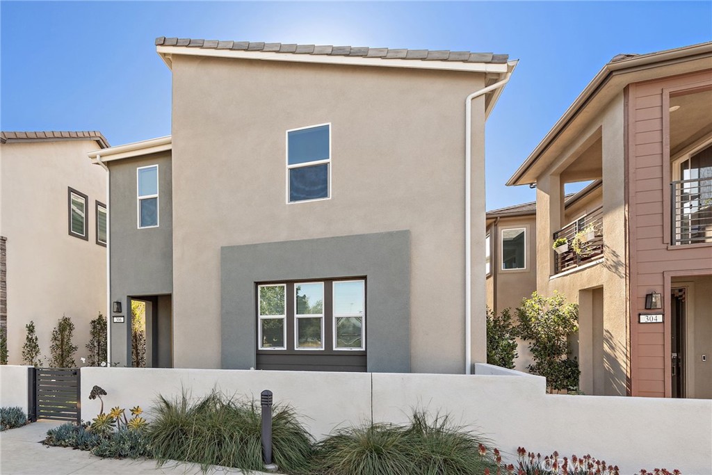 306 Merit Irvine, CA 92618 - Photo 1 of 1 a view of a house with a yard